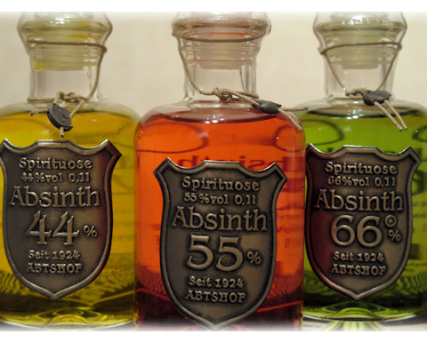 Tre absintflaskor